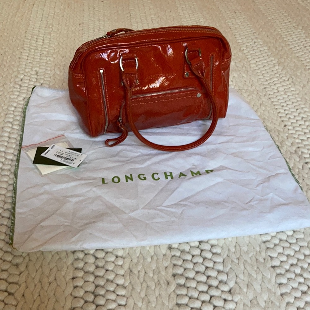 Orange patent leather Longchamp bag